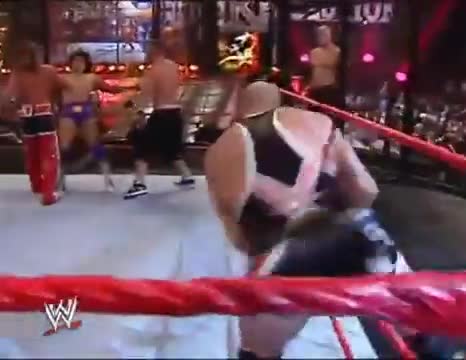 Kurt Angle enters the Elimination Chamber and wrecks everyone in the ring (New Year's Revolution 2006)